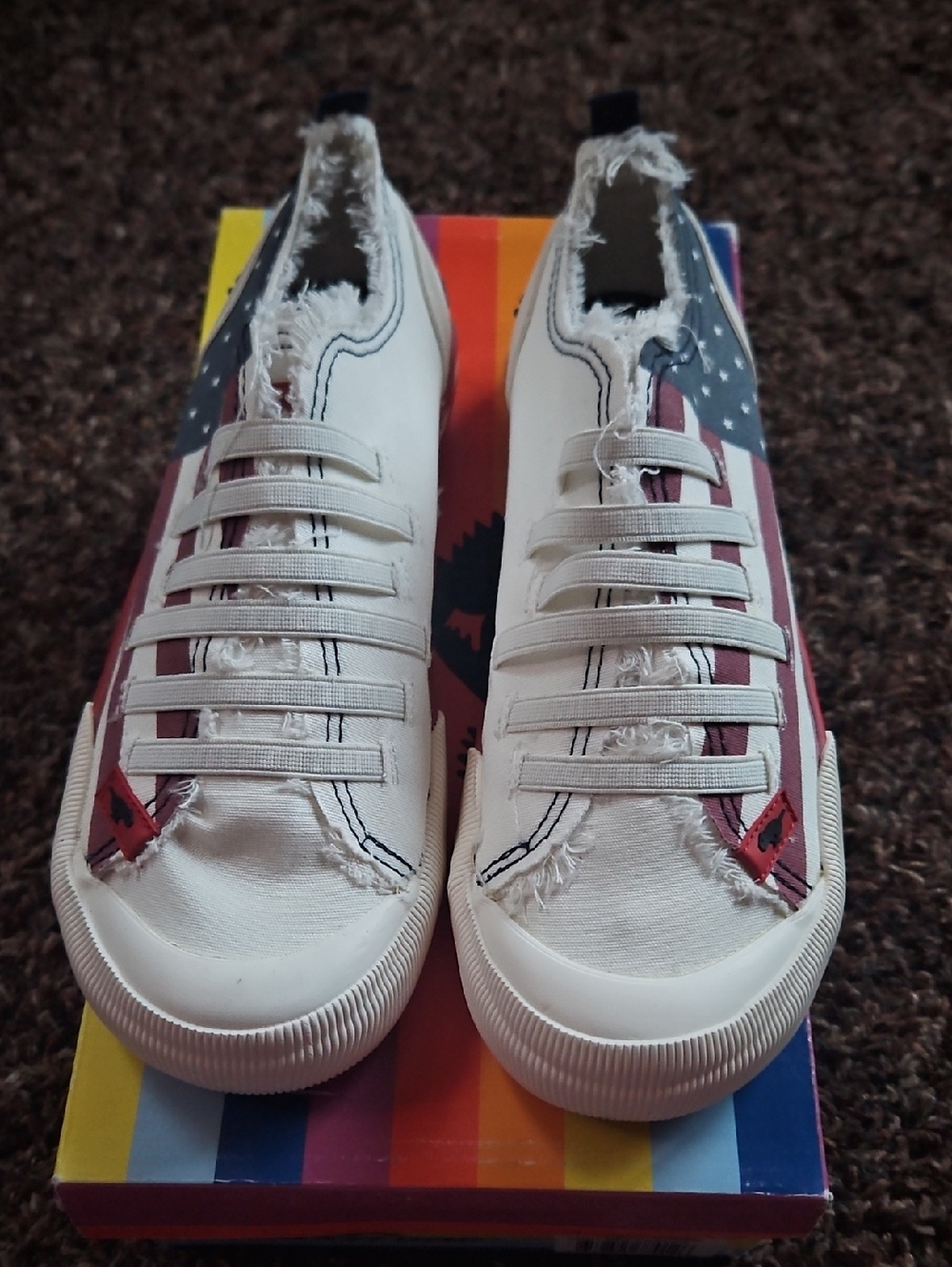 Rocket Dog White Slip-On Sneakers with Red and Blue Flag Detail